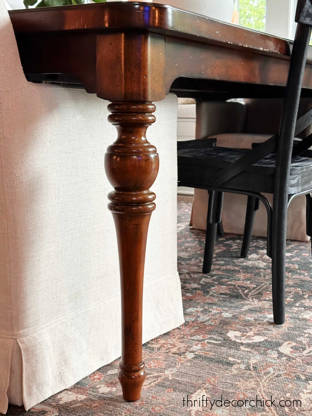 turned legs on wood dining table